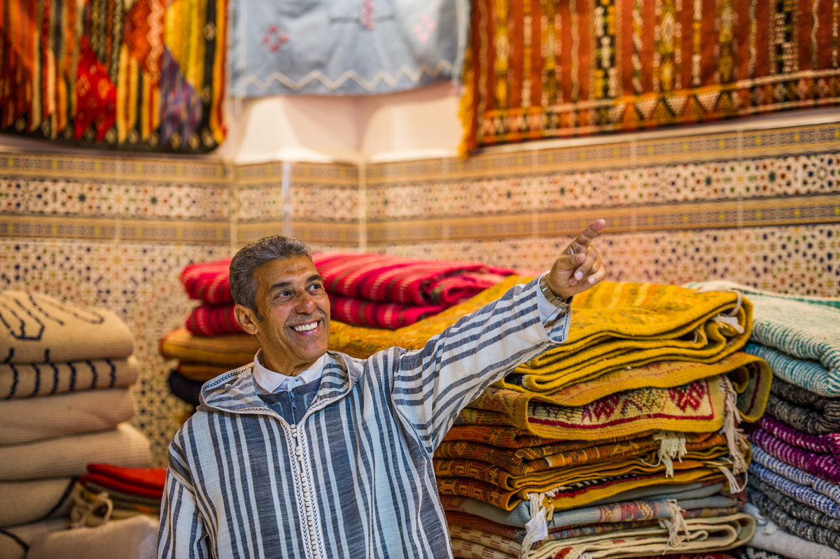 Carpet Shop owner in marrakech medina | The team is born and raised in Marrakech, we have been licensed guides by the ministry of tourism for a while now. we speak fluent English and have led tours from 1-20 people.We are the pioneers of Airbnb Experiences in Marrakech and we know a thing or two about customer service and tour guiding.